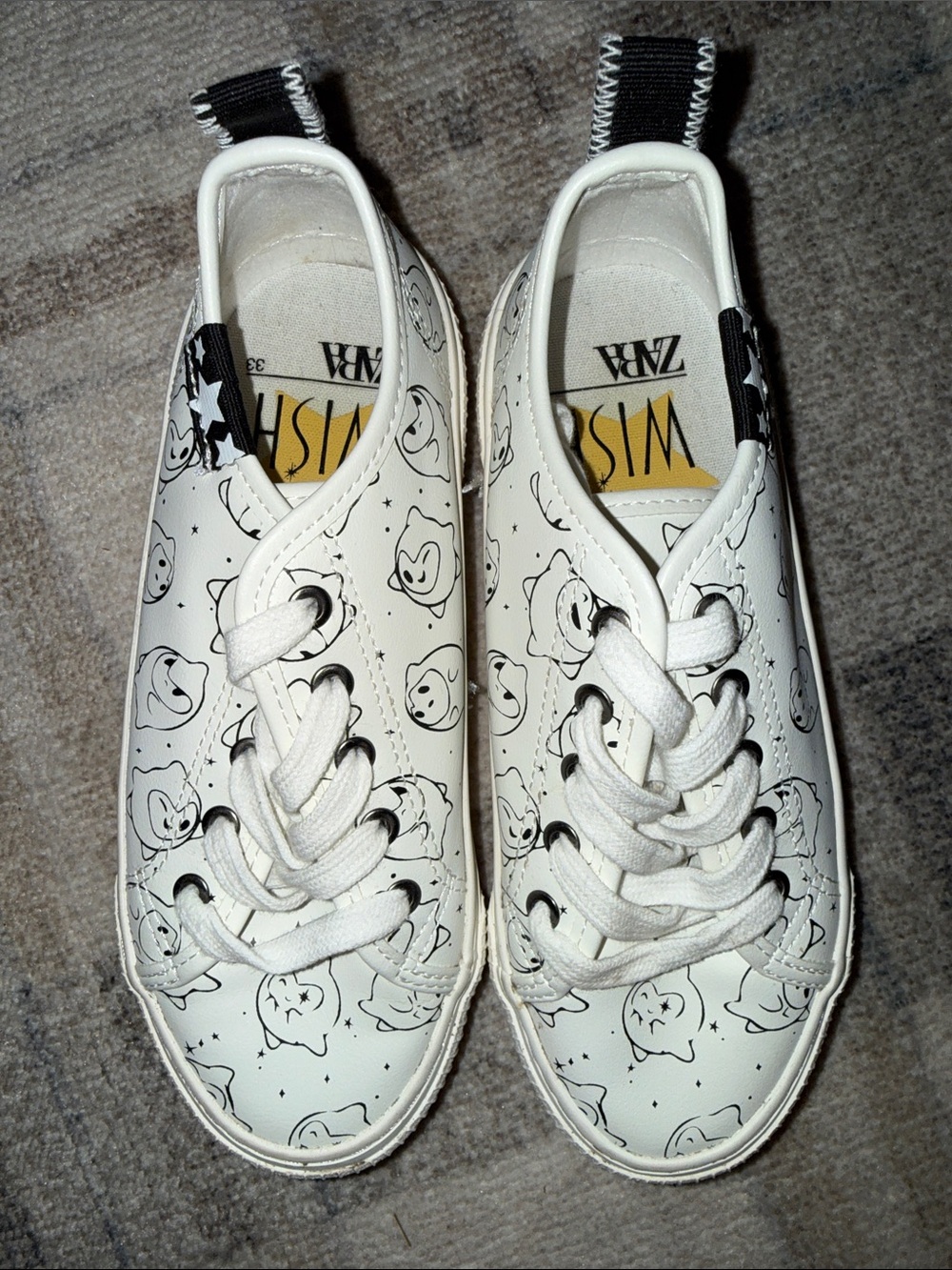 Zara White Sneakers with Black Character Print from Disney’s Wish